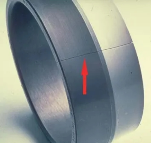 Figure 3. Overload fracture of the inner ring of a self-aligning roller bearing..png Figure 3. Overload fracture of the inner ring of a self-aligning roller bearing..png