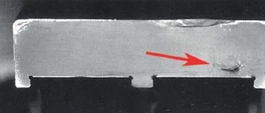 Figure 4. Fatigue fracture cross-section of the cam roller outer ring caused by bending..png Figure 4. Fatigue fracture cross-section of the cam roller outer ring caused by bending..png