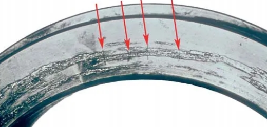 Figure 6. Thermal cracks on the small end of the inner ring of a tapered roller bearing..png Figure 6. Thermal cracks on the small end of the inner ring of a tapered roller bearing..png